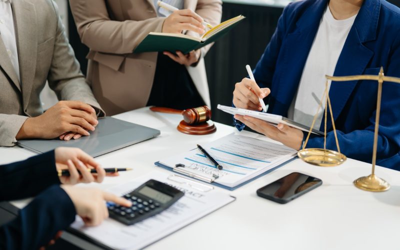 image of lawyers discussing collecting using an assignment order